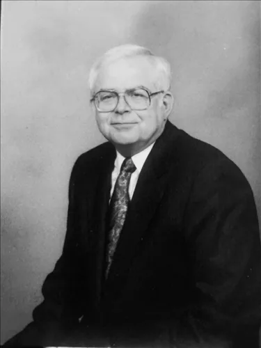 DR. ROBERT L. CALDWELL